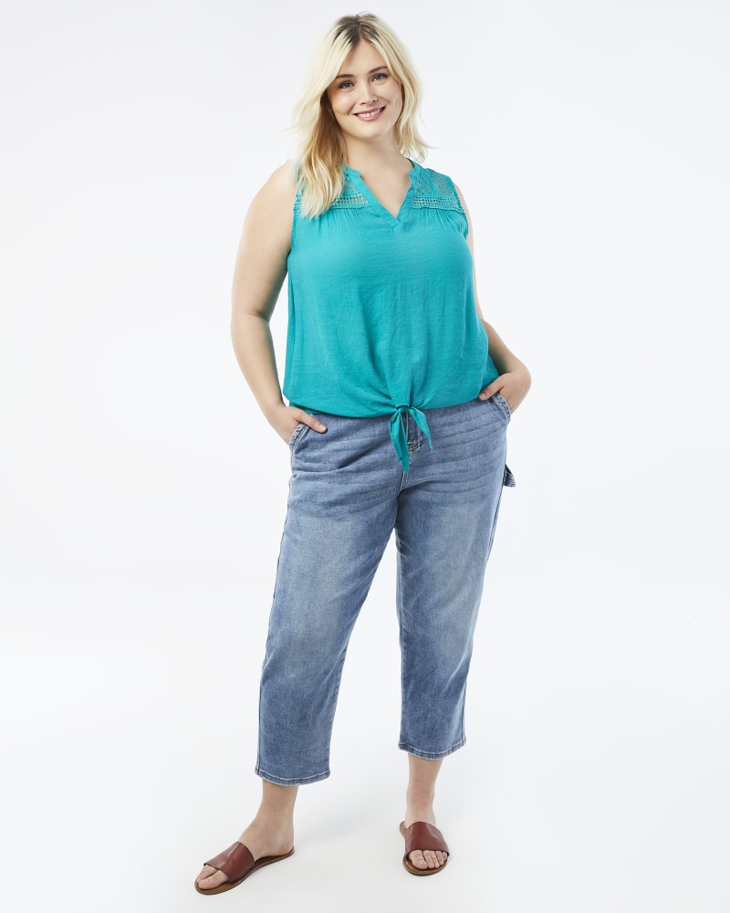 Plus size model with hourglass body shape wearing Stefani Cropped Carpenter Jean by Meri Skye | Dia&Co | dia_product_style_image_id:158108